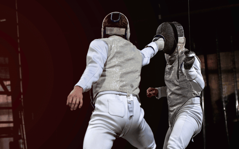 Soldiers practicing combat strategies, improving fencing techniques